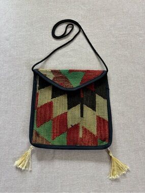 Vintage woven tassel carpet purse.